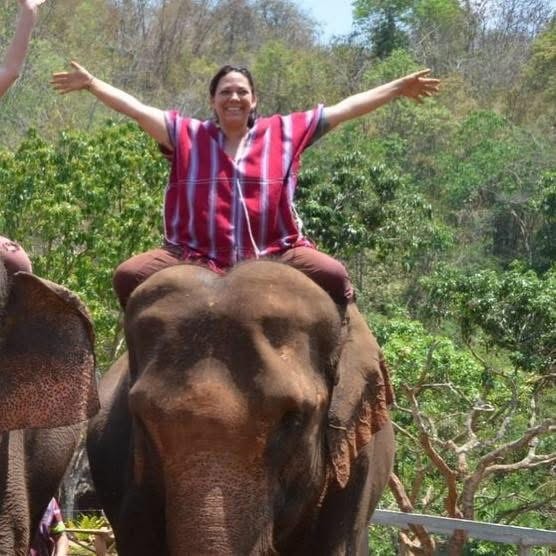 Shasta riding an elephant