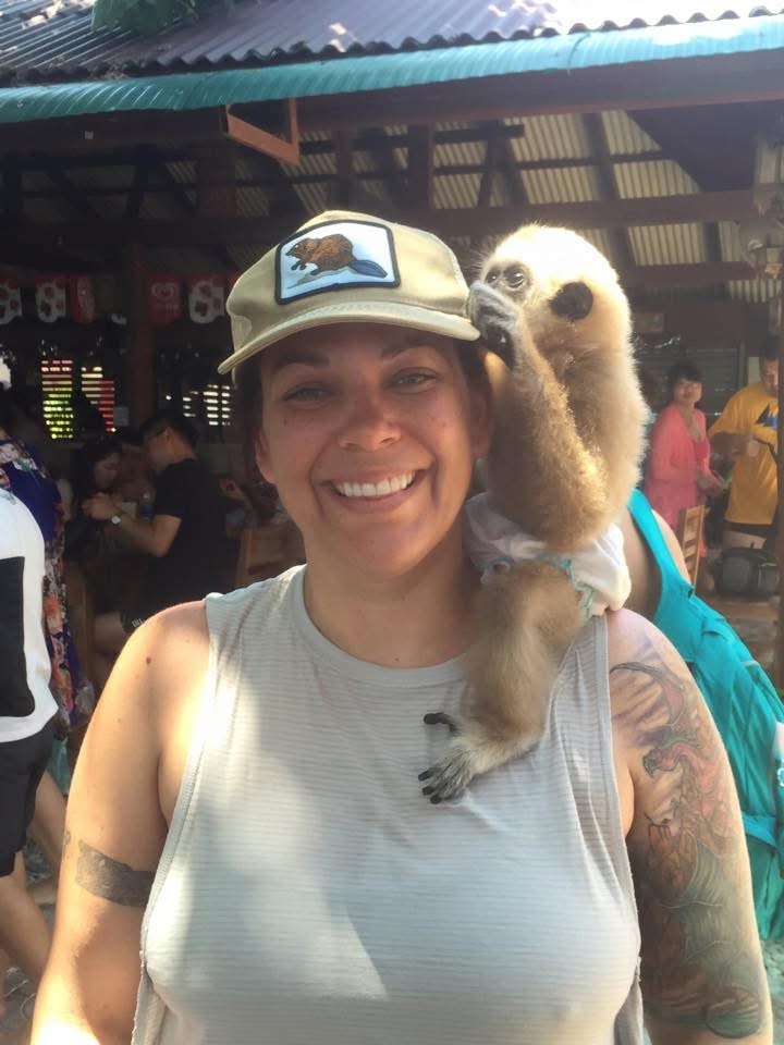 Shasta with a gibbon in Thailand